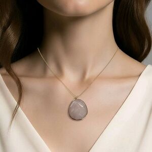 Elegant Rose Quartz Set In Gold Colored Setting Love Stone